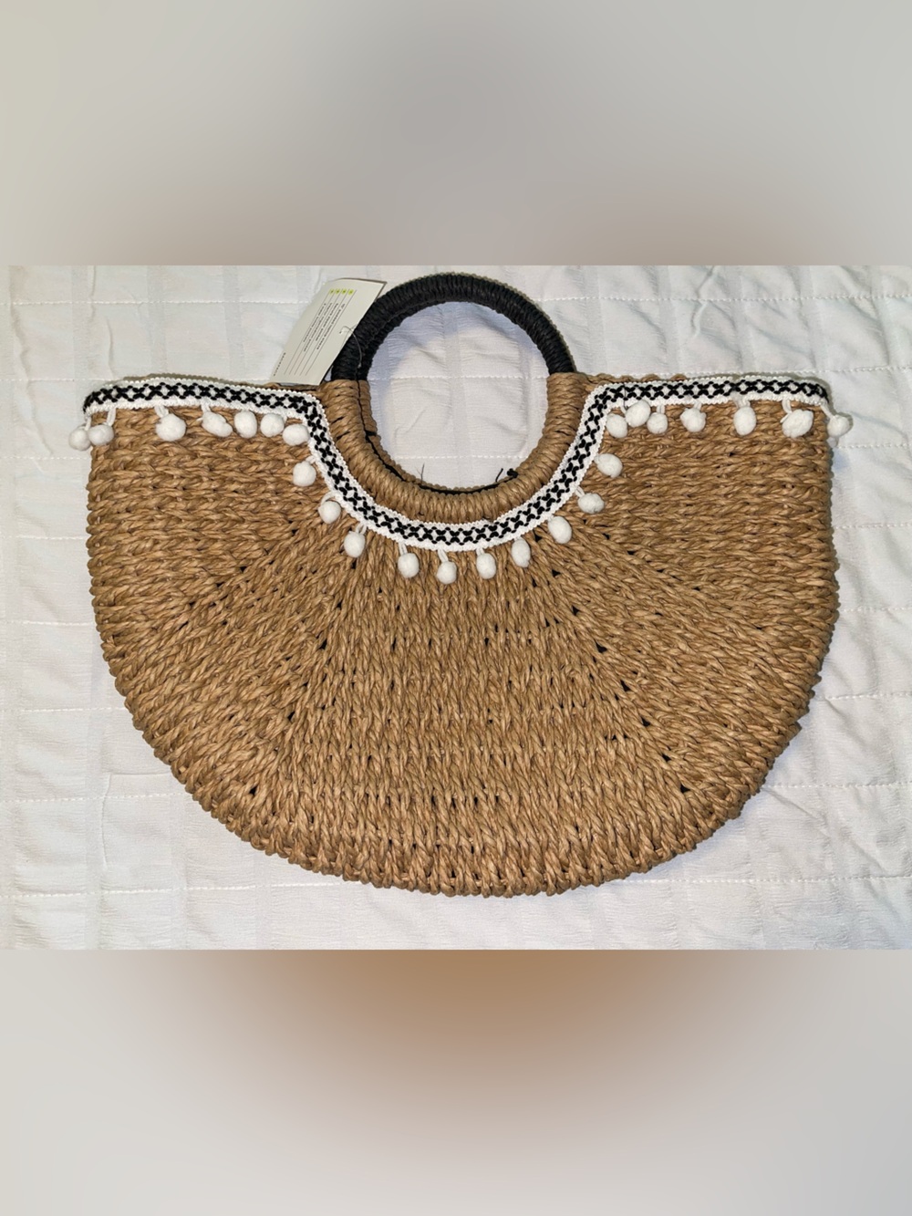 Savannah Natural Straw Tote with White Pom Trim and Black Handles